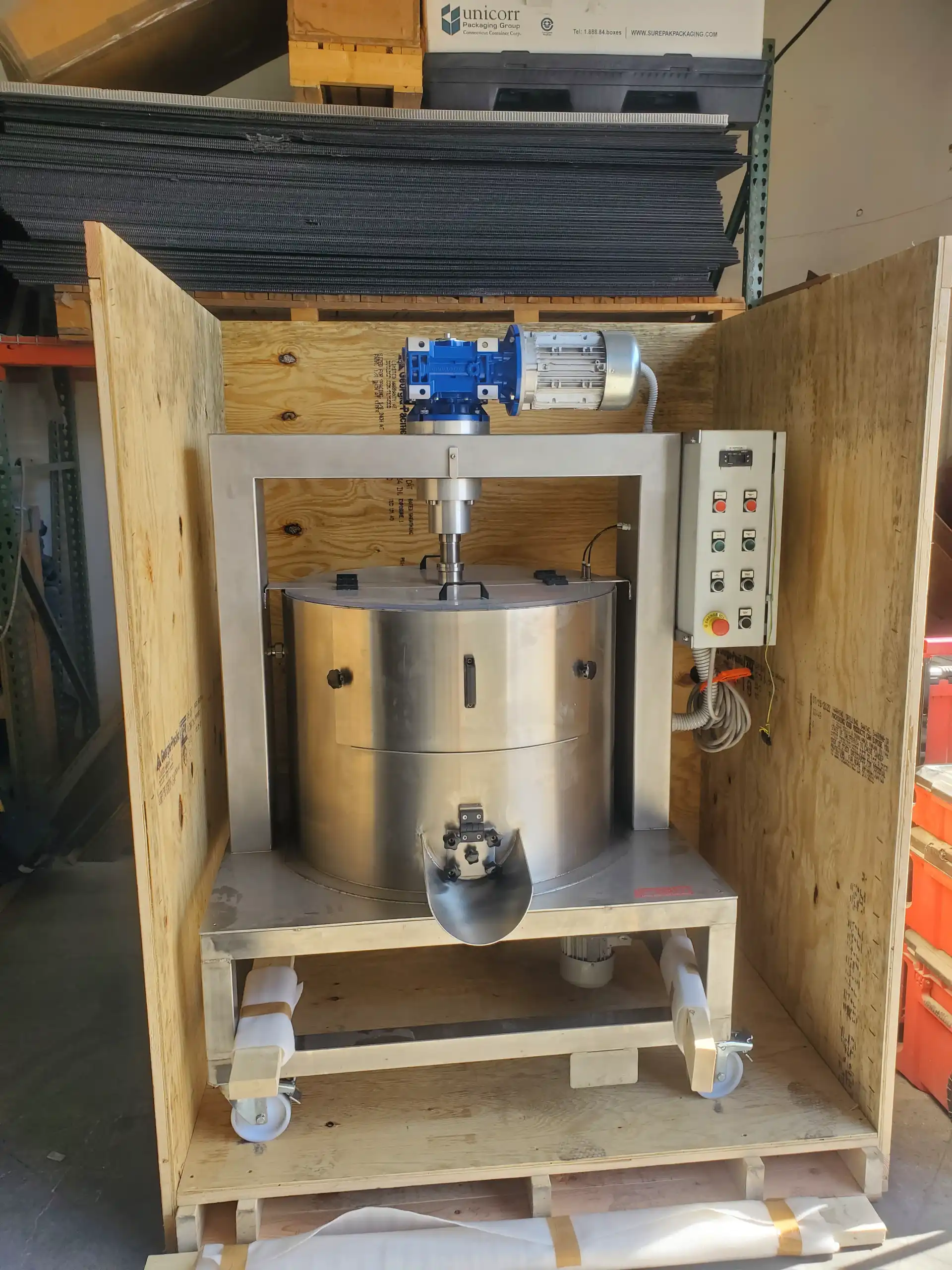 Industrial equipment crated for shipping in the warehouse